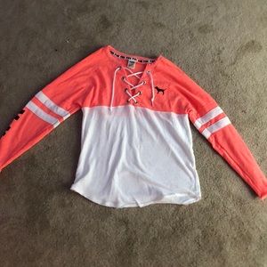 pink and white long sleeve shirt from pink
